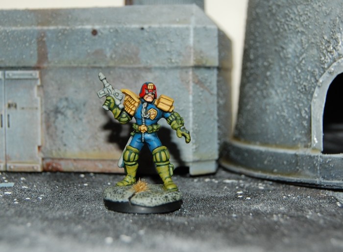 Wargames Foundry Judge Dredd painted according to the Kevin Dallimore tutorial -- a mini I painted some time back but a nice photograph, I think anyway... 